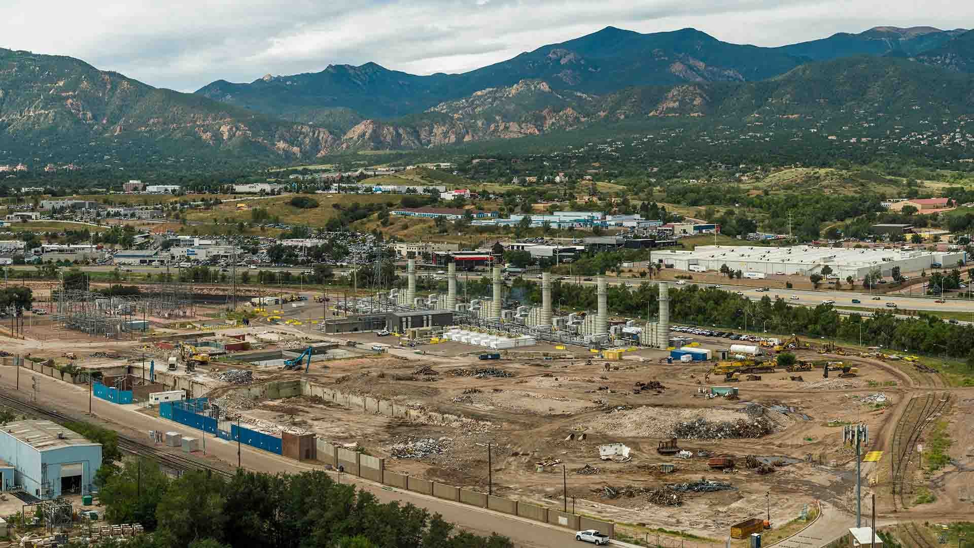 Aerial photo of the mostly empty demolition site of the Martin Drake Power Plant.