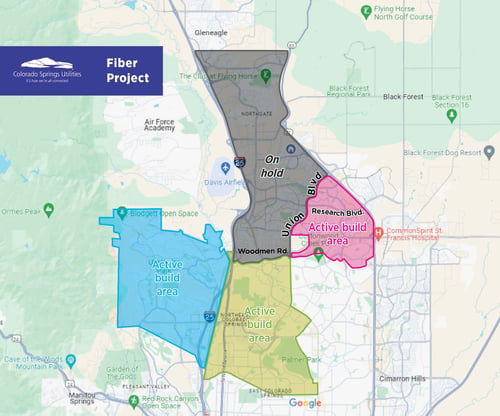 A map of Colorado Springs showing four build areas for the fiber network project. The Rockrimmon neighborhood, Pikeview and Woodmen Corridor are active build areas, while Northgate & Briargate are on-hold.