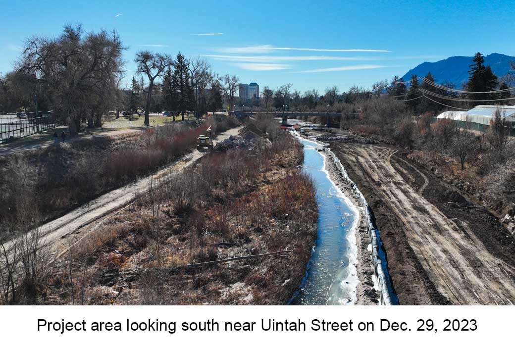 Aerial photo of Monument Creek near Uintah Street taken on December 29, 2023. Tire tracks from heavy equipment are visible on both sides of the creek.